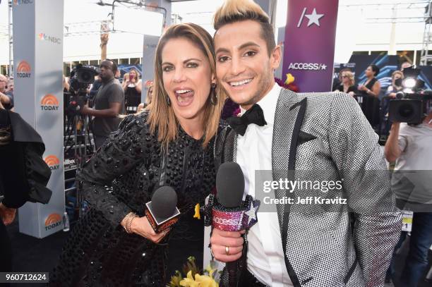 Natalie Morales and Frankie J. Grande attend the 2018 Billboard Music Awards at MGM Grand Garden Arena on May 20, 2018 in Las Vegas, Nevada.