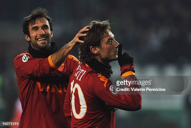 Francesco Totti of AS Roma celebrates his goal with Mirko Vucinic during the Serie A match between Juventus FC and AS Roma at Olimpico Stadium on...