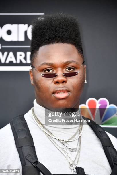 Influencer Denzel Dion attends the 2018 Billboard Music Awards at MGM Grand Garden Arena on May 20, 2018 in Las Vegas, Nevada.