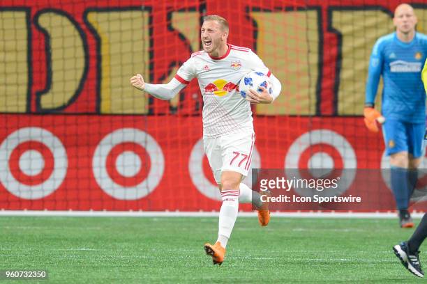 New York's Daniel Royer celebrates after scoring a penalty kick goal during the match between Atlanta United and New York Red Bulls on May 20, 2018...