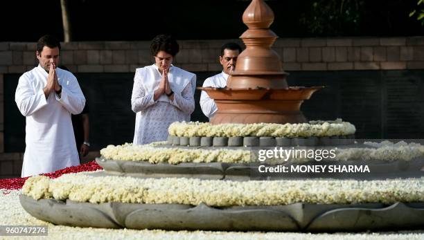 Indian Congress party president Rahul Gandhi , accompanied by his sister Priyanka Gandhi and her husband Robert Vadra, pay tribute to their late...