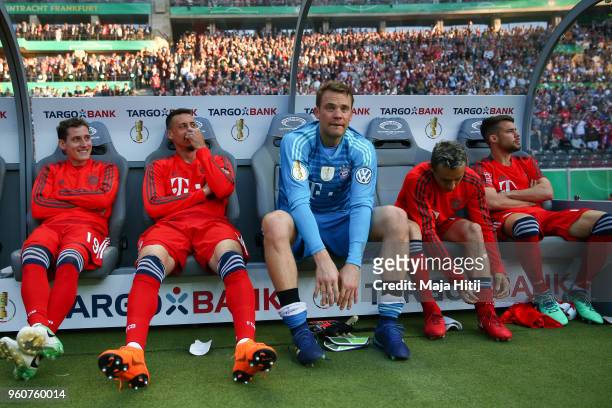 Sebastian Rudy of FC Bayern Muenchen , Sandro Wagner, Manuel Neuer and Rafinha and Juan Bernat sit on the bank prior the DFB Cup final between Bayern...