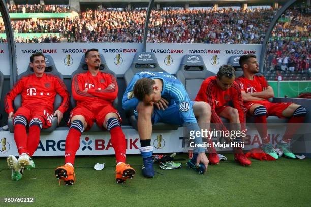 Sebastian Rudy of FC Bayern Muenchen , Sandro Wagner, Manuel Neuer and Rafinha and Juan Bernat sit on the bench prior the DFB Cup final between...