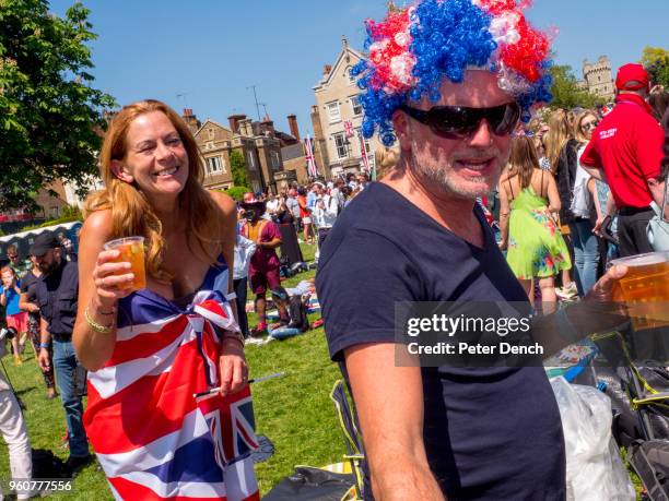 Well-wishers attend the wedding of Prince Harry to Ms. Meghan Markle at Windsor Castle on May 19, 2018 in Windsor, England. Prince Henry Charles...