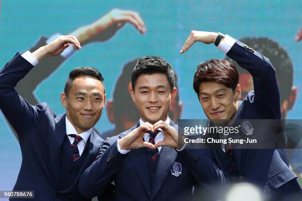Moon Seon-Min, Ju Se-Jong and Lee Chung-Yong of South Korea attend the sending off ceremony for FIFA World Cup Russia 2018 at Seoul City Hall on May...