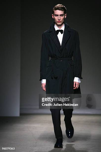 Model walks the catwalk during the Dunhill fashion show during Paris Menswear Fashion Week Autumn/Winter 2010 at Palais De Tokyo on January 23, 2010...