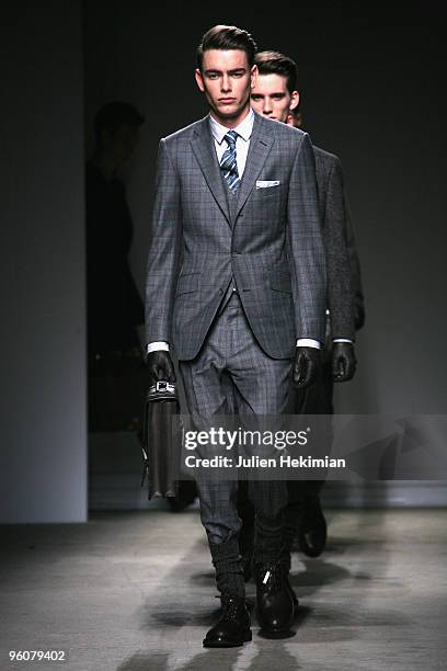 Models walk the catwalk during the Dunhill fashion show during Paris Menswear Fashion Week Autumn/Winter 2010 at Palais De Tokyo on January 23, 2010...