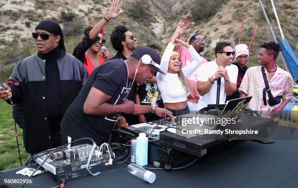 Musician Stevie Wonder, DJ Mal-Ski, Sophia Morris, Kwame Morris, Kai Millard, Keita Morris, Chad Millard and Kailand Morris onstage at MANDAFEST...