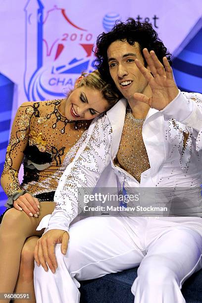 Tanith Belbin and Benjamin Agosto watch their scores from the kiss and cry after the free dance competition during the US Figure Skating...