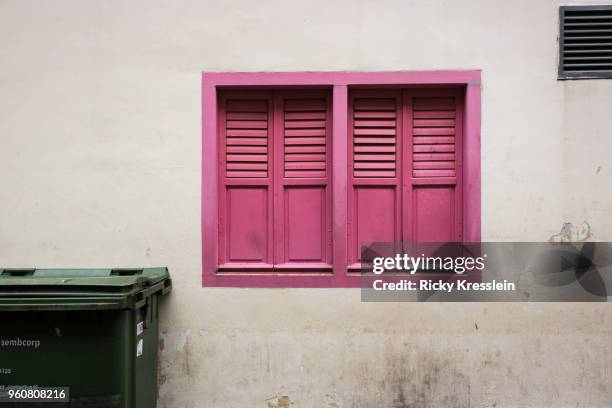 pink shutters - singapore alley stock pictures, royalty-free photos & images