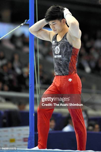 Kakeru Tanigawa shows dejection as he falls while competing in the Horizontal Bar during day two of the Artistic Gymnastics NHK Trophy at the Tokyo...