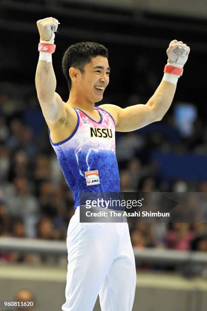 Kenzo Shirai celebrates after competing in the Horizontal Bar during day two of the Artistic Gymnastics NHK Trophy at the Tokyo Metropolitan...