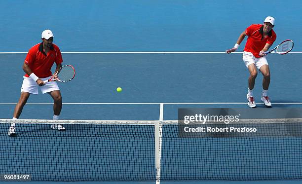 Nenad Zimonjic of Serbia and Daniel Nestor of Canada during their third round doubles match against Philipp Marx of Germany and Igor Zelenay of...