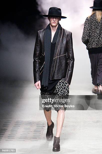 Model walks the runway at Damir Doma fashion show during Paris Menswear Fashion Week Autumn/Winter 2010 Garage Turenne on January 23, 2010 in Paris,...