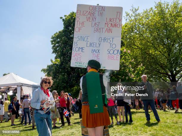 An anti-royalist at the wedding of Prince Harry to Ms. Meghan Markle at Windsor Castle on May 19, 2018 in Windsor, England. Prince Henry Charles...
