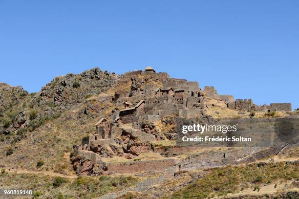 Incan terraces of Moray and Ruins of Pisac. The Incan site of Pisac and the agricultural terraces at Moray, near the old city of Cuzco, at an...