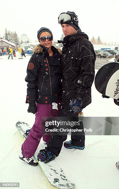 Paris Hilton and Doug Reinhardt attend Oakley "Learn To Ride" Snowboard fueled by Muscle Milk at Oakley Lodge on January 23, 2010 in Park City, Utah.