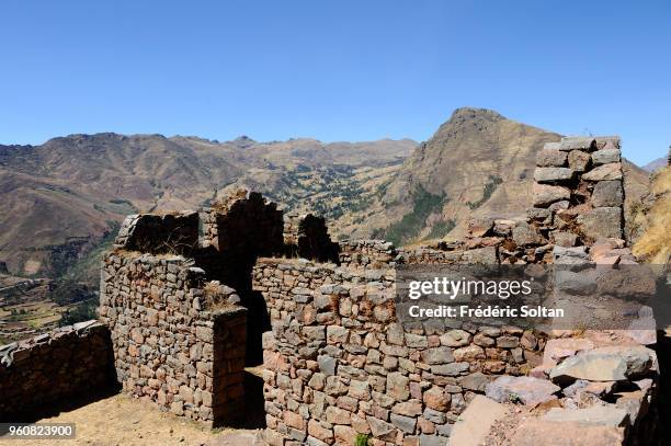 Incan terraces of Moray and Ruins of Pisac. The Incan site of Pisac and the agricultural terraces at Moray, near the old city of Cuzco, at an...