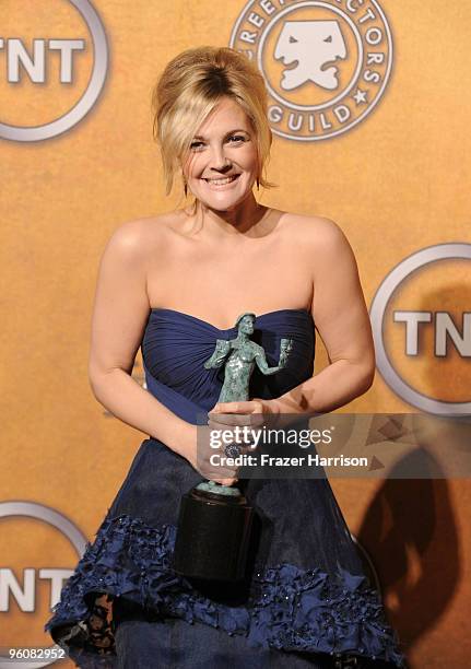 Actress Drew Barremore poses with the Female Actor In A Television Movie Or Miniseries award for 'Grey Gardens' in the press room at the 16th Annual...