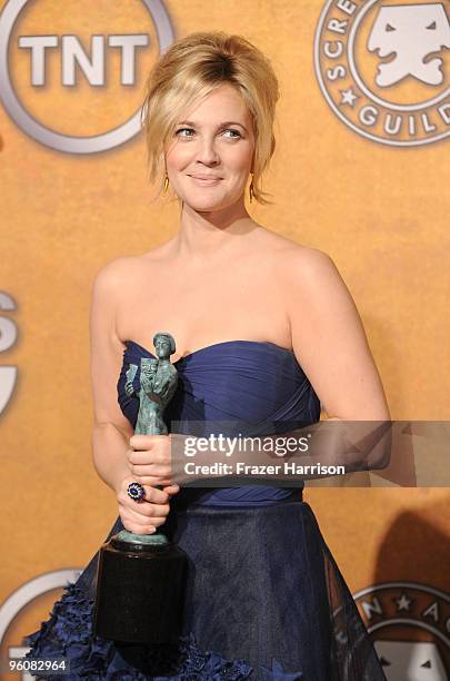 Actress Drew Barremore poses with the Female Actor In A Television Movie Or Miniseries award for 'Grey Gardens' in the press room at the 16th Annual...