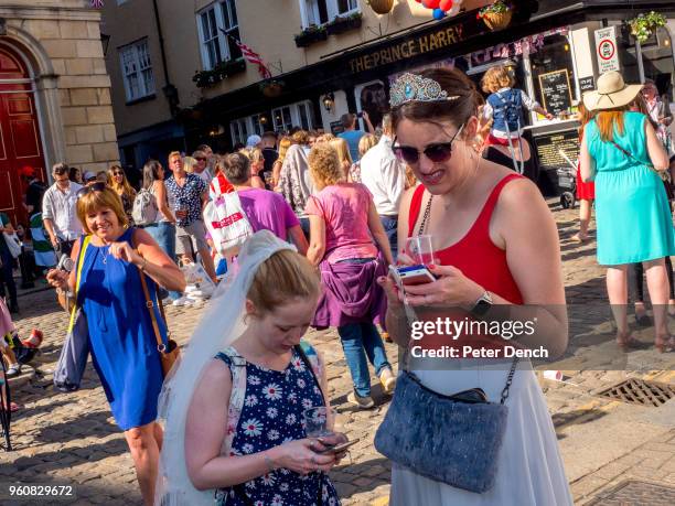 Well-wishers relax after the wedding of Prince Harry to Ms. Meghan Markle at Windsor Castle on May 19, 2018 in Windsor, England. Prince Henry Charles...