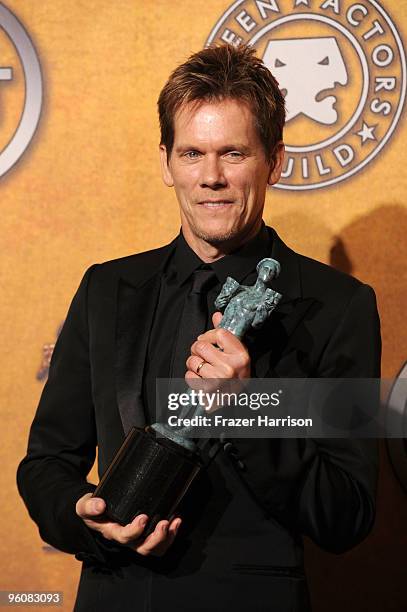 Actor Kevin Bacon poses with the Male Actor In A TV Movie or Miniseries award for 'Taking Chance' in the press room at the 16th Annual Screen Actors...