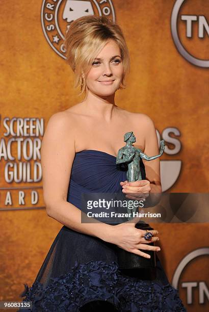 Actress Drew Barremore poses with the Female Actor In A Television Movie Or Miniseries award for 'Grey Gardens' in the press room at the 16th Annual...