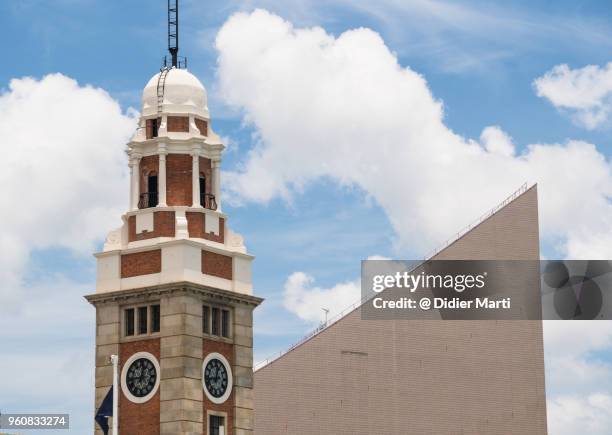 the famous kowloon-canton railway clock tower in tsim sha tsui in hong kong - canton tower imagens e fotografias de stock