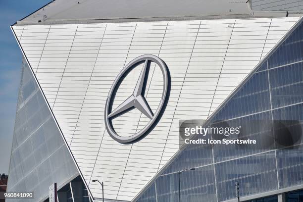 Detailed view of the Mercedes-Benz Stadium logo is seen on the exterior of the Mercedes-Benz Stadium during an NFL football game between the...