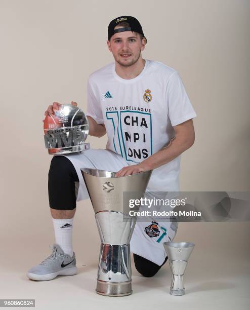 Luka Doncic, #7 of Real Madrid poses with Chamipons Trophy, replica and MVP of the final Trophy 2018 Turkish Airlines EuroLeague F4 Champion Photo...