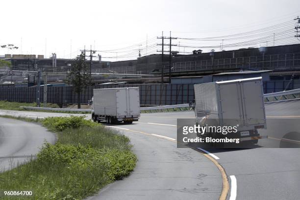 Hino Motors Ltd. Autonomous trucks travel in convoy during a demonstration at a test course in Hamura, Tokyo Metropolis, Japan, on Monday, May 21,...