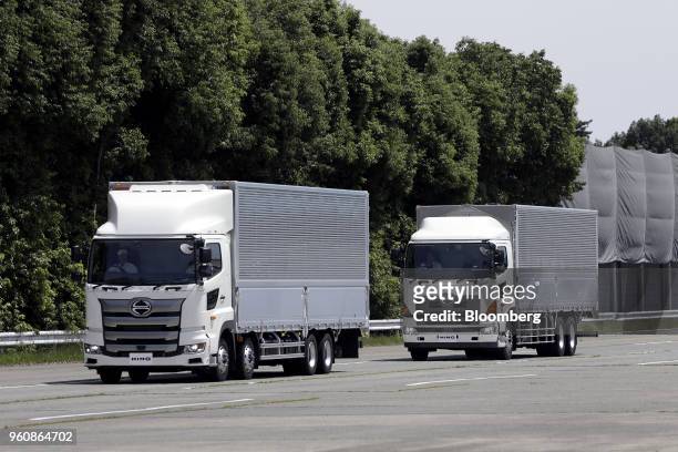 Hino Motors Ltd. Autonomous trucks travel in convoy during a demonstration at a test course in Hamura, Tokyo Metropolis, Japan, on Monday, May 21,...