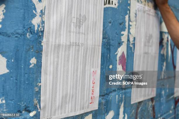 Registration list seen as people wait for their turn to vote at a polling station. The presidential elections called by the National Constituent...