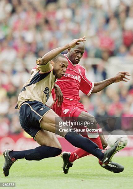 Thierry Henry of Arsenal and Ugo Ehiogu of Middlesbrough challenge for the ball during the FA Barclaycard Premiership match played at the Riverside...