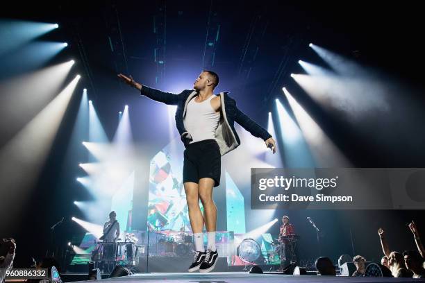 Wayne Sermon, Daniel Platzman, Dan Reynolds and Ben McKee of Imagine Dragons perform on stage at Spark Arena on May 21, 2018 in Auckland, New Zealand.