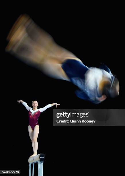 Sophie Crisante of Queensland competes on the Beam as Abigail Griffiths competes on the Floor during the 2018 Australian Gymnastics Championships at...