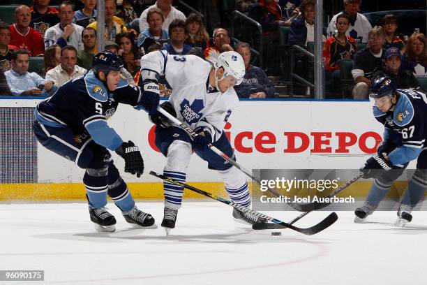 Bryan Allen of the Florida Panthers defends against Alexei Ponikarovsky of the Toronto Maple Leafs on January 23, 2010 at the BankAtlantic Center in...
