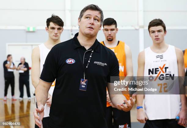 Premier Hawthorn Hawks ruckman Robert Campbell instructs players before their vertical leap test at the Melbourne Sports and Aquatic Centre on May...