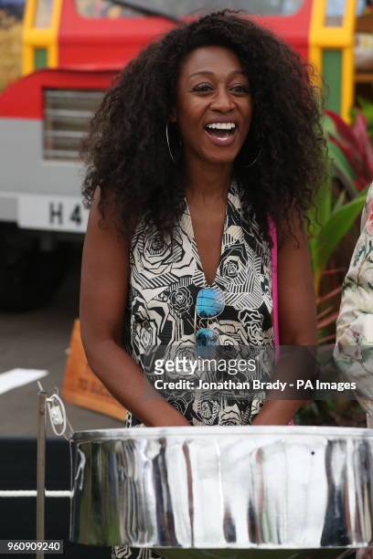 Beverley Knight plays a steel drum during the press day for this year's RHS Chelsea Flower Show at the Royal Hospital Chelsea, London.