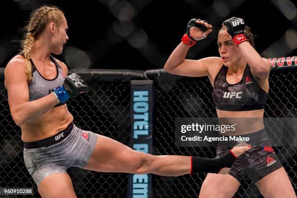 Andrea Lee of USA kicks Veronica Macedo of Venezuela in the women's flyweight fight during the UFC Fight Night event at the Movistar Arena, on May...