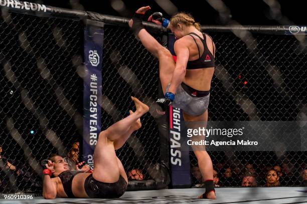 Andrea Lee of USA kicks Veronica Macedo of Venezuela in the women's flyweight fight during the UFC Fight Night event at the Movistar Arena, on May...