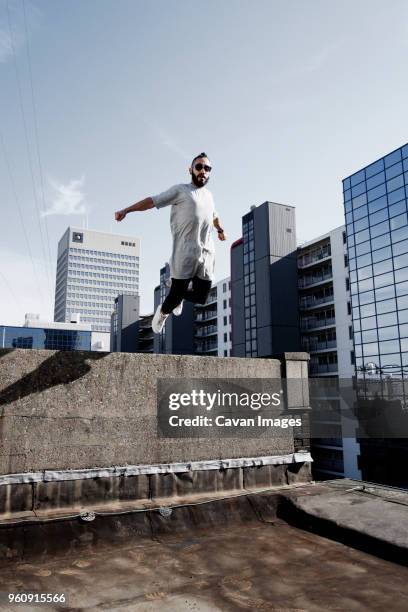88 Man Jumping Window Office Stock Photos, High-Res Pictures, and ...