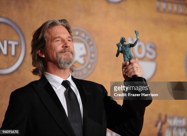 Actor Jeff Bridges poses with the Male Actor In A Leading Role award for 'Crazy Heart' in the press room at the 16th Annual Screen Actors Guild...