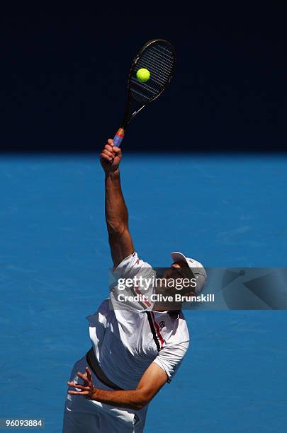 Ivo Karlovic of Croatia serves in his fourth round match against Rafael Nadal of Spain during day seven of the 2010 Australian Open at Melbourne Park...