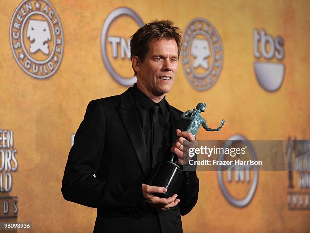 Actor Kevin Bacon poses with the Male Actor In A TV Movie or Miniseries award for 'Taking Chance' in the press room at the 16th Annual Screen Actors...