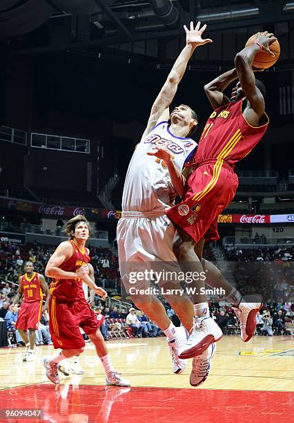 Oliver Layfayette of the Fort Wayne Mad Ants takes a shot against Pat Carroll left of the Iowa Energy on January 23, 2010 at Wells Fargo Arena in Des...