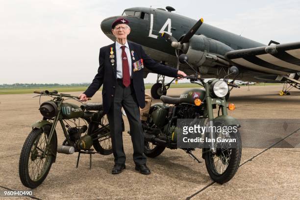May 21: Arnhem Veteran Fred Glover poses with both the original Royal Enfield Flying Flea motorcycle and the 'Classic 500 Pegasus' motorcycle on May...