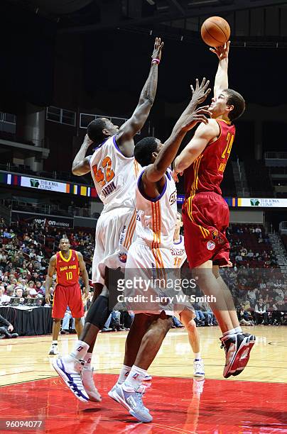 Rob Kurz of the Fort Wayne Mad Ants takes a shot against Othyus Jeffers and Earl Barron of the Iowa Energy on January 23, 2010 at Wells Fargo Arena...