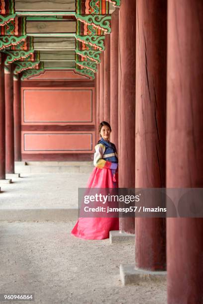 korean woman in hanbok (korean traditional costume) at changdeokgung palace in seoul - changdeokgung palace stock pictures, royalty-free photos & images