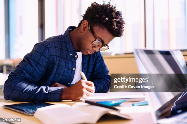 11,645 Young Black Man Writing Stock Photos, High-Res Pictures, and ...